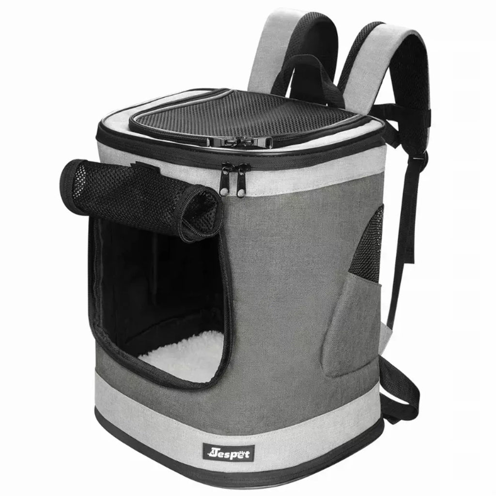 Gray pet carrier backpack with a visible brand logo