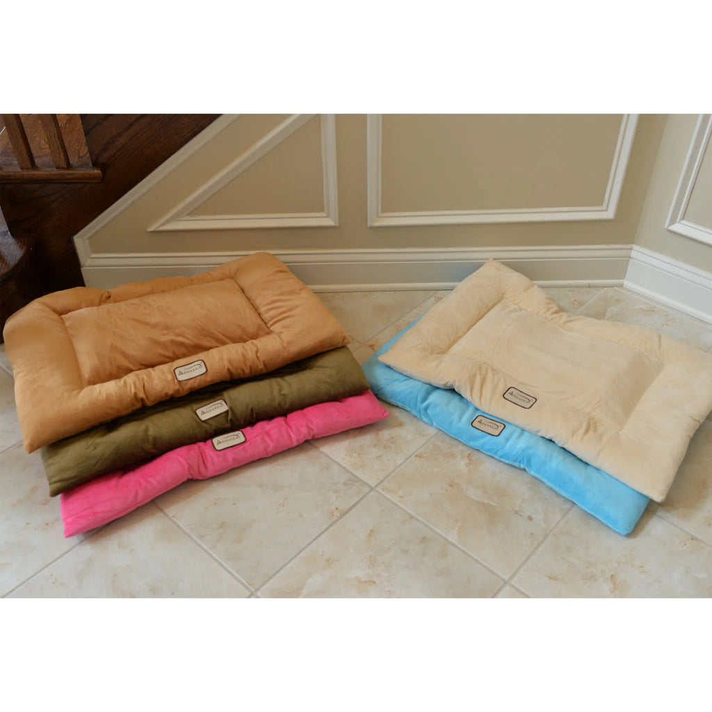 Stack of colorful pet beds/crate pads on a tiled floor.