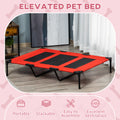 Red and black elevated pet bed on a wooden floor with measurements 