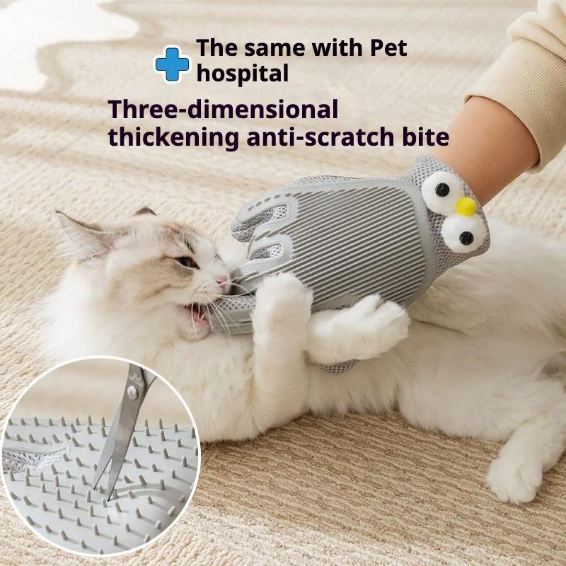 Person wearing a gray pet grooming glove with a cat