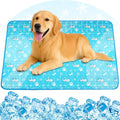 Dog lying on a blue cooling pad with ice cubes at the bottom